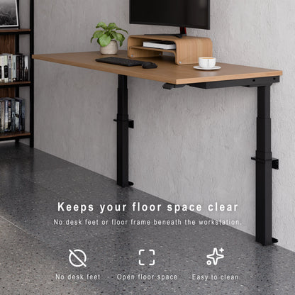 Wall-mounted height adjustable desk with no desk feet or floor frame, keeping the floor space clear. Wooden desk with adjustable height against a gray wall, featuring text about its benefits.