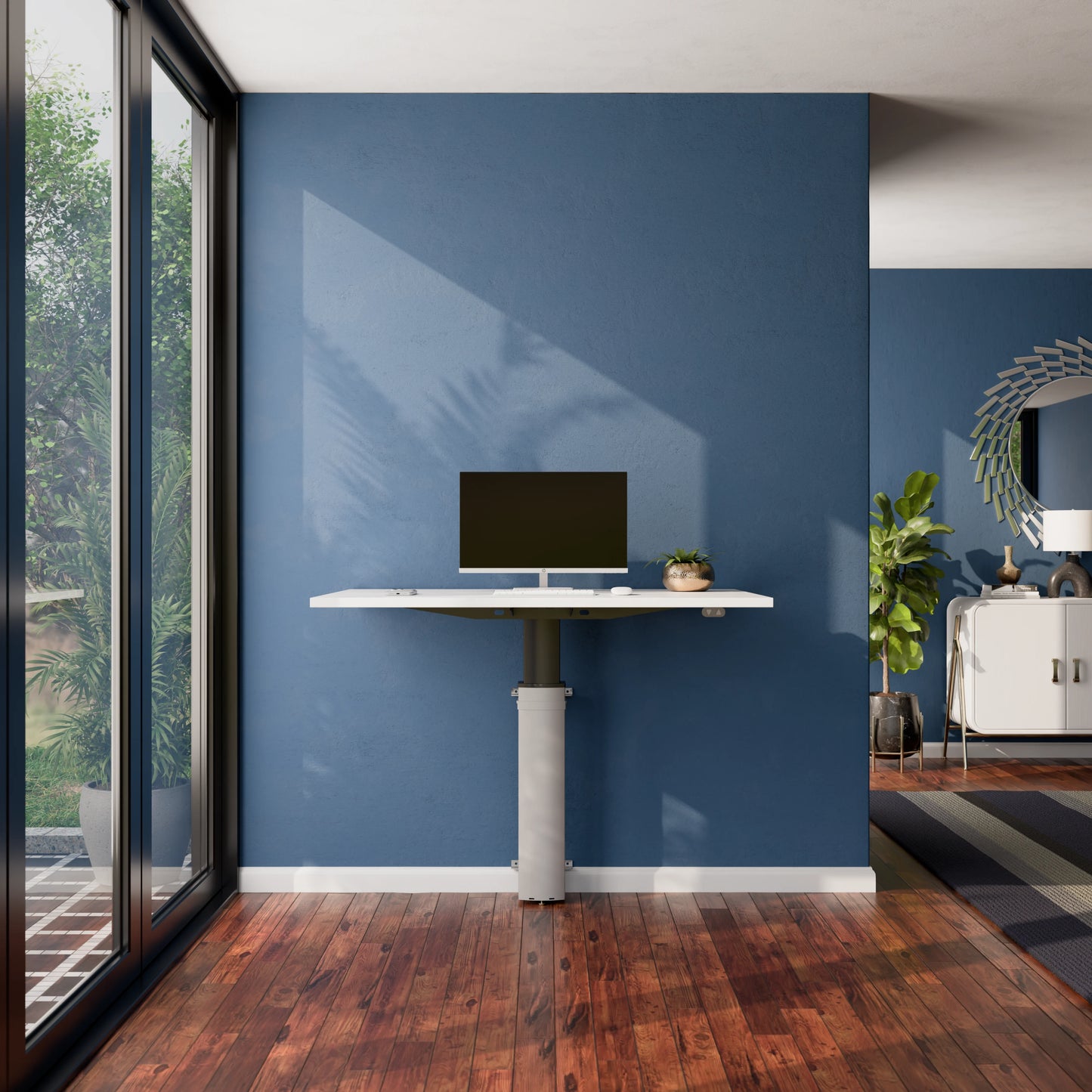 ConSet 501-19 modular wall mounted standing desk with white desktop and monitor in a home office