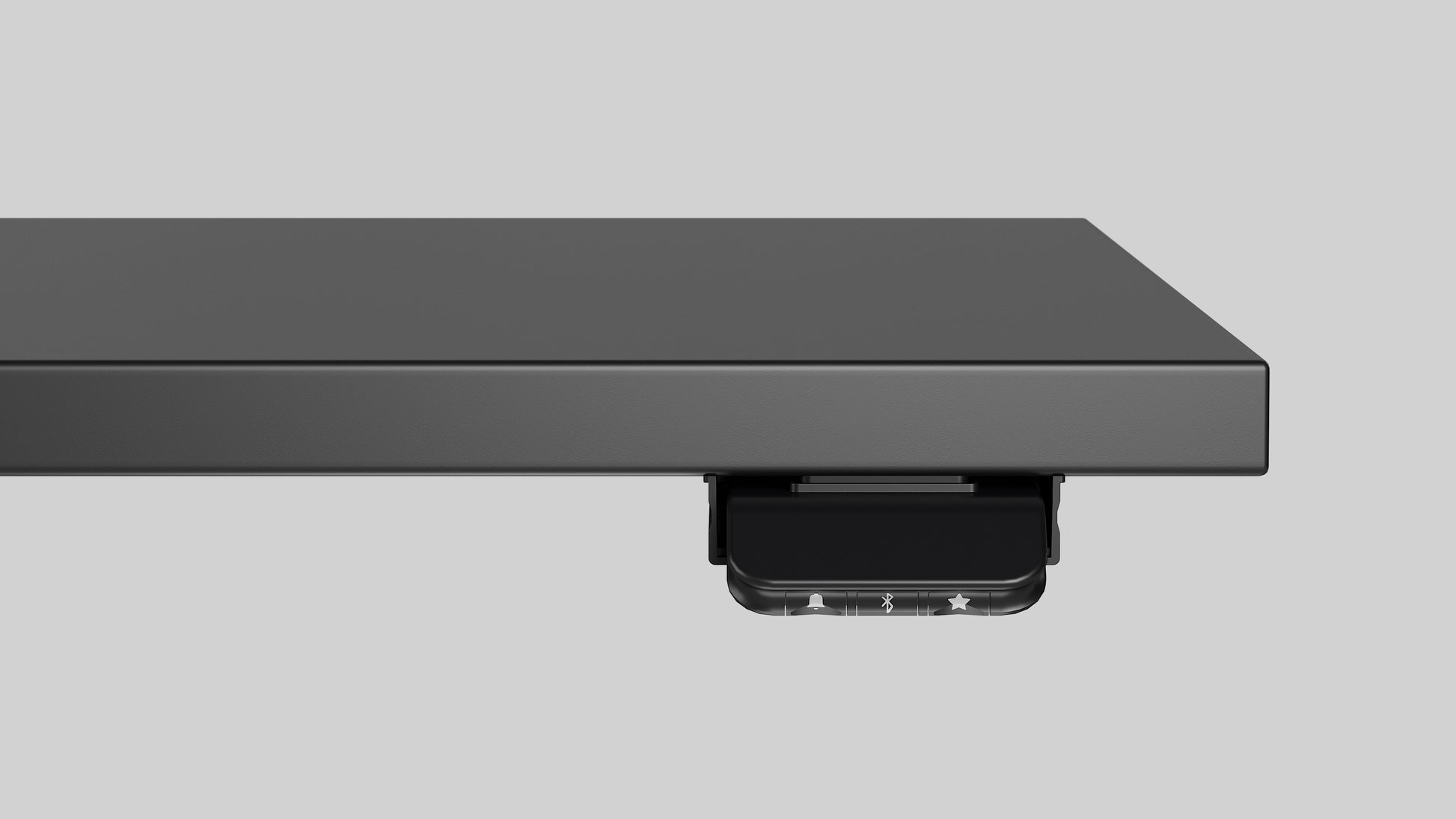 Close up of a LINAK DGG1C controller on LINAK Wall Solo height adjustable desk with black top, front view